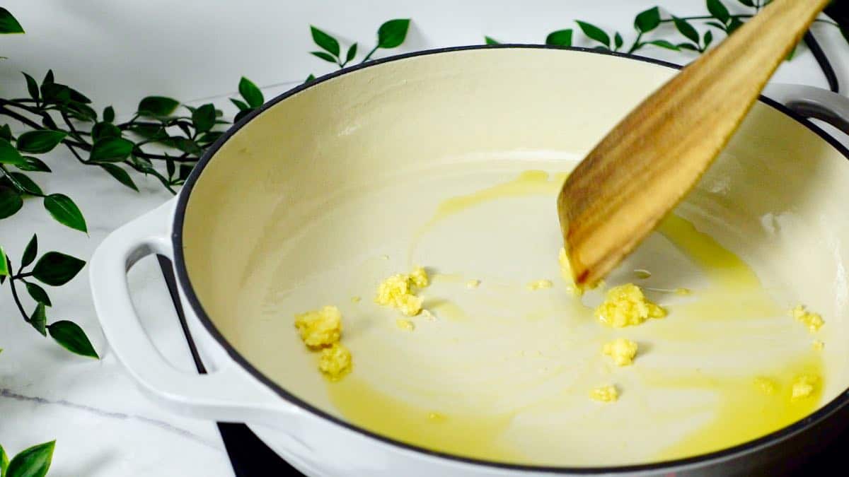 sautéing garlic in a pan