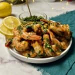 a closeup of the plate containing chimichurri shrimp