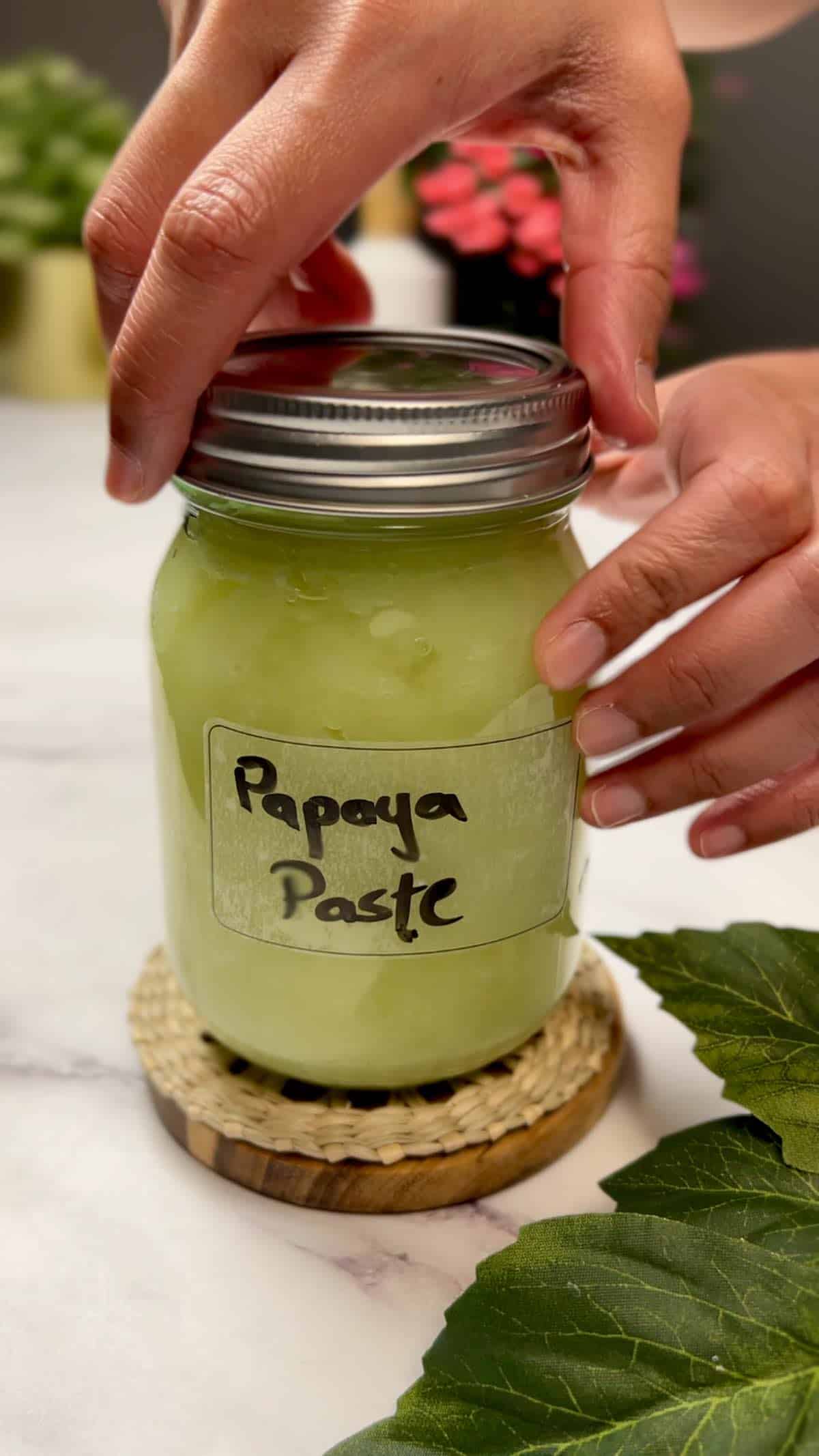 green papaya paste in a bottle for refrigeration