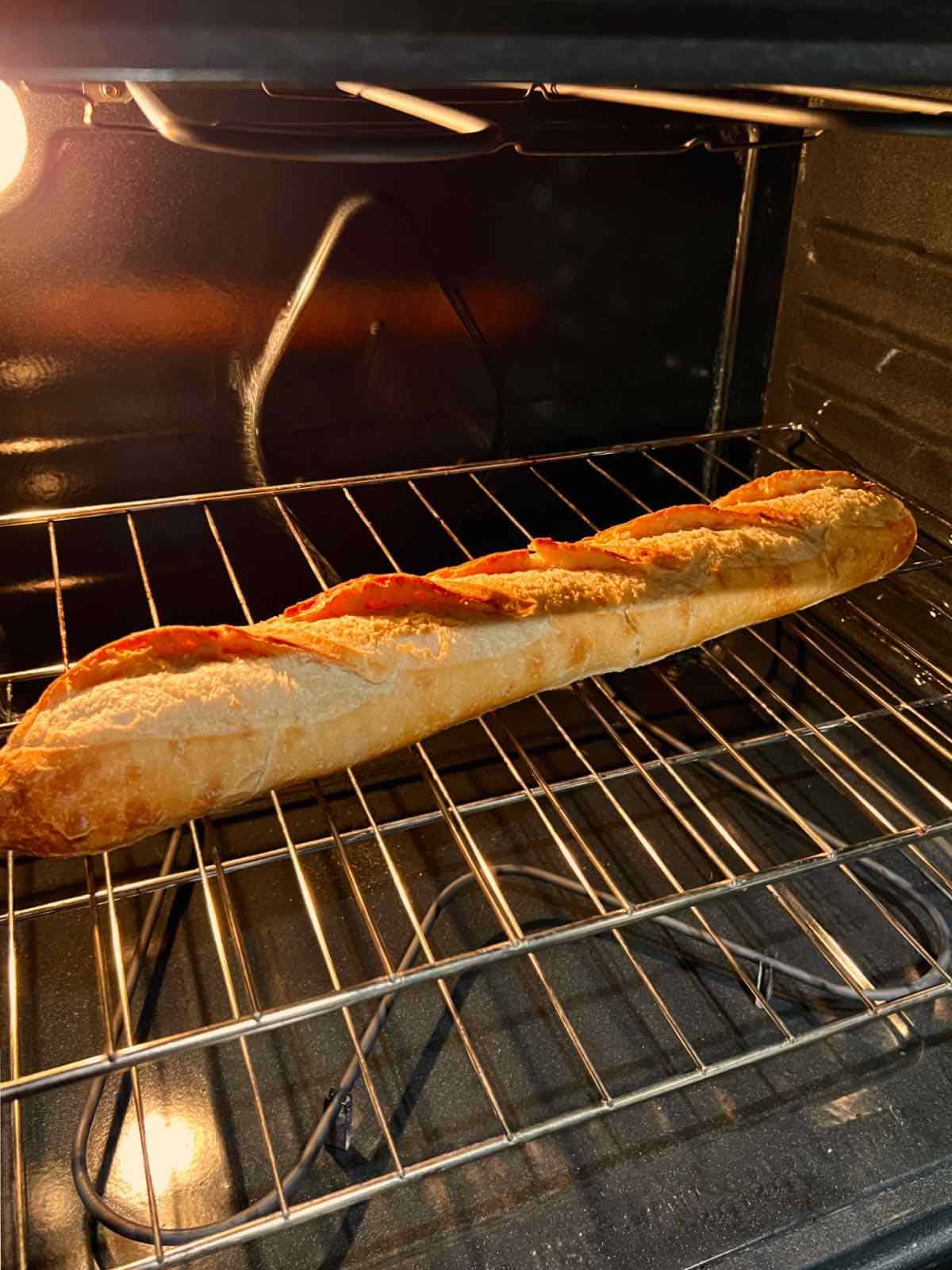 softening a stale french baguette in the oven
