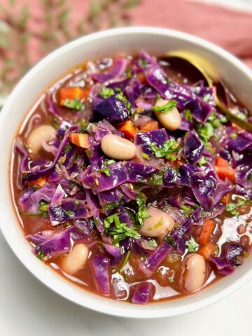 a bowl of purple cabbage soup