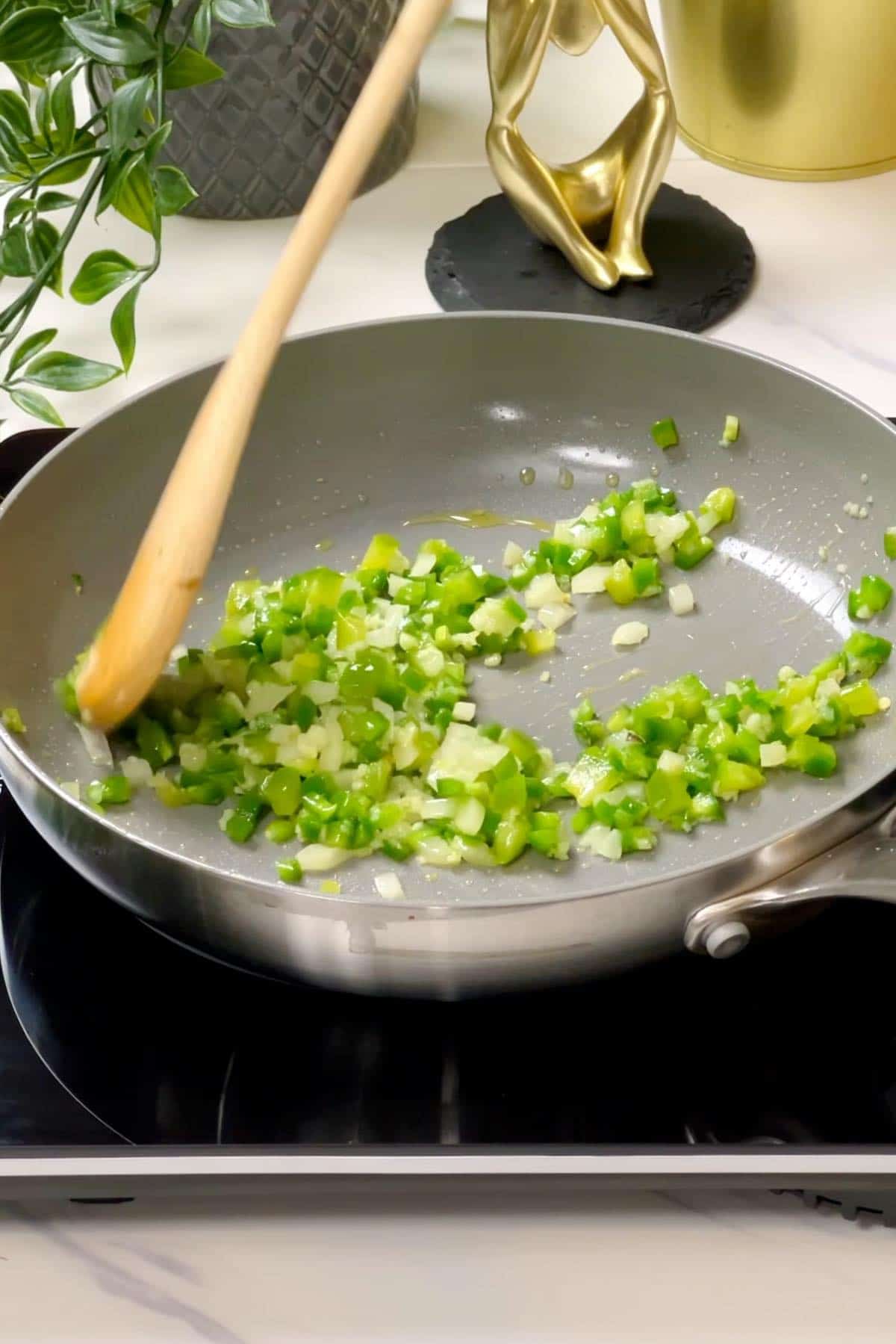 sauteing the jalapeno filling ingredients