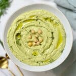 lemon dill hummus topped with some chickpeas