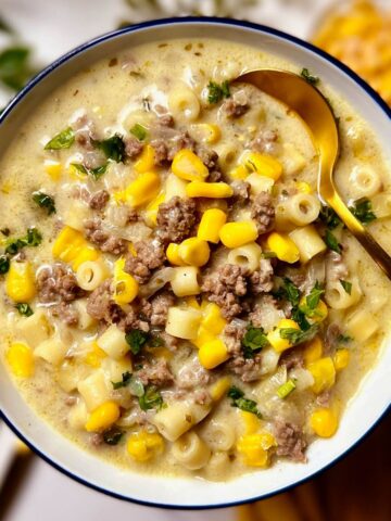 ground beef and corn soup in a bowl