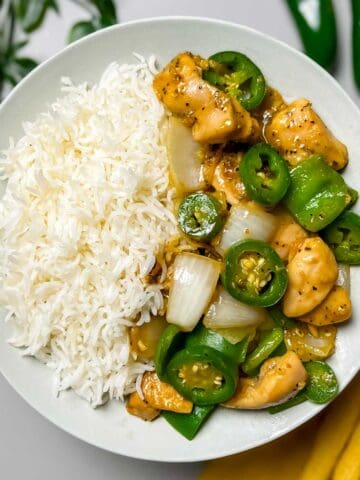 jalapeno chicken stir fry and rice on a plate