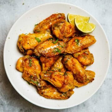garlic lime chickens wings on a plate