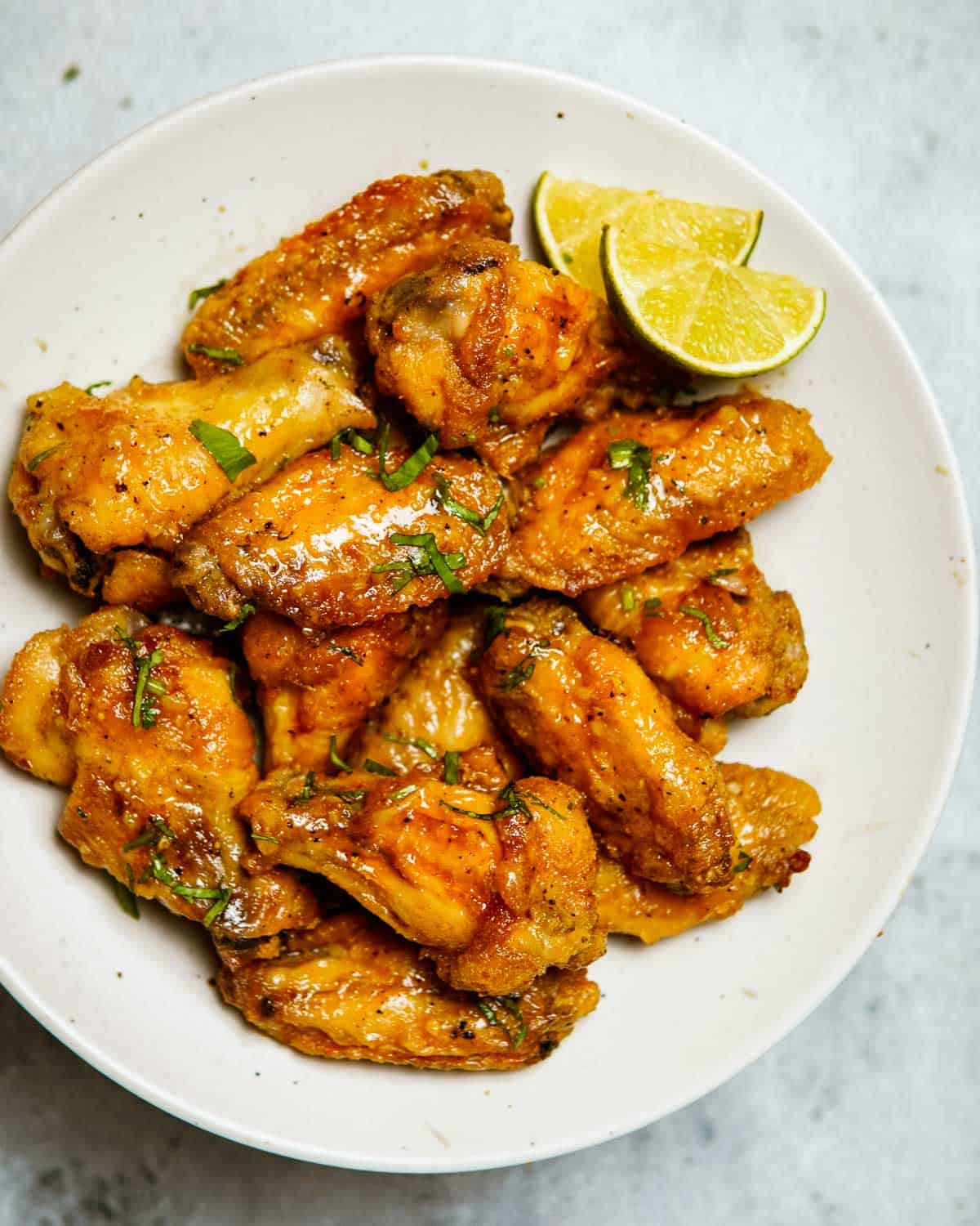 garlic lime chicken wings served on a plate