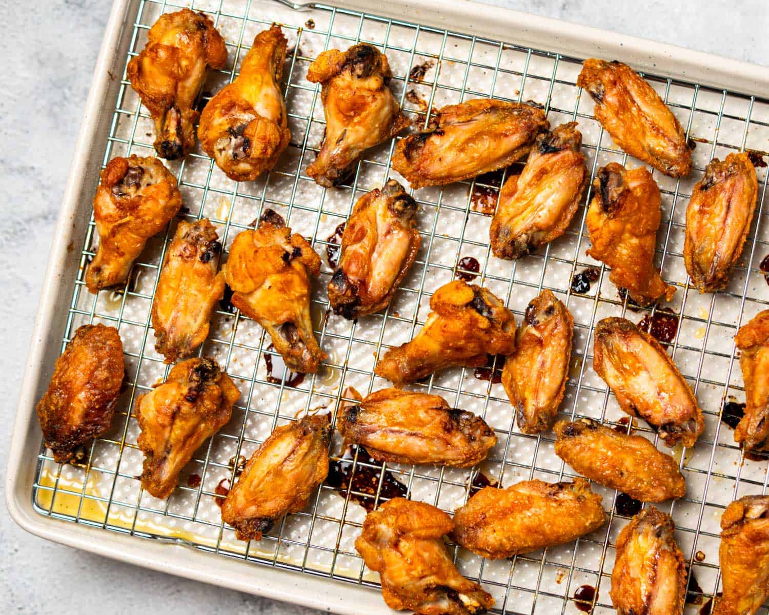 crispy baked chicken wings on a baking sheet