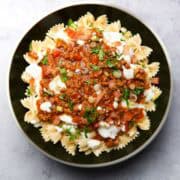 a plate containing ground chicken taco pasta