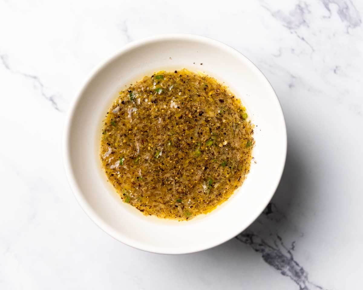 lemon pepper marinade liquid in a bowl