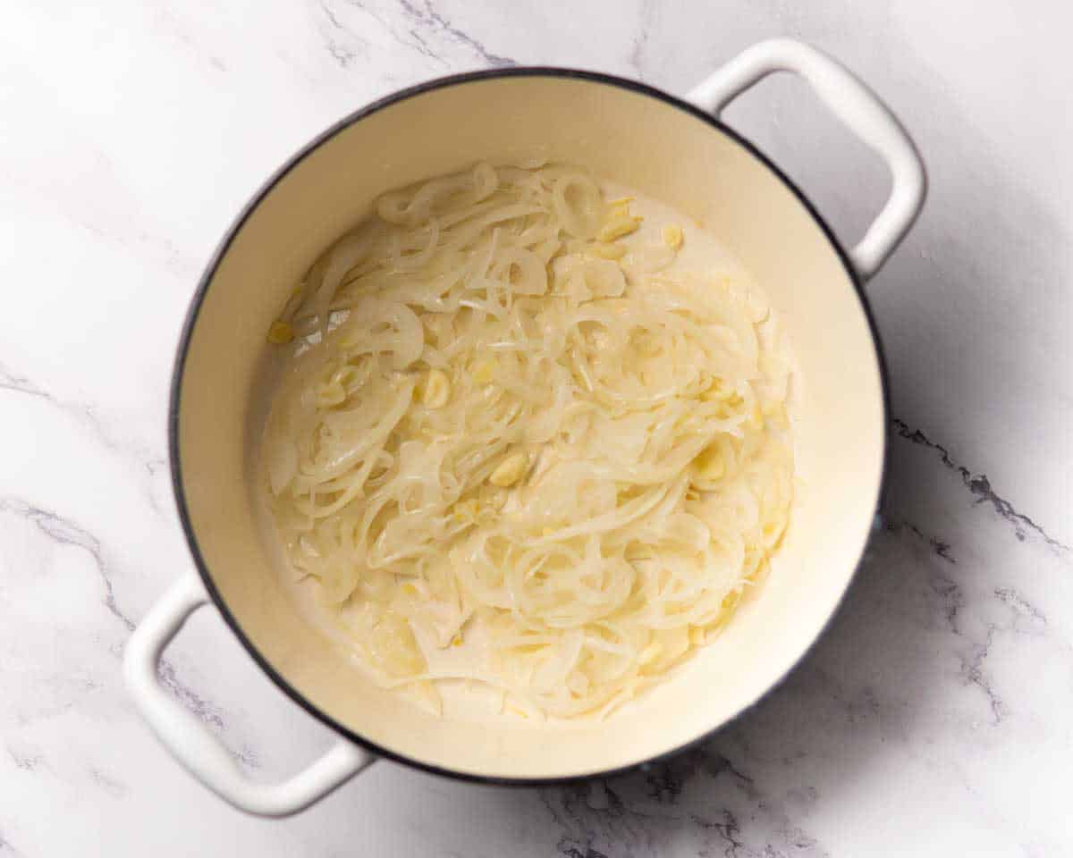 onion and garlic sauteing in a pot
