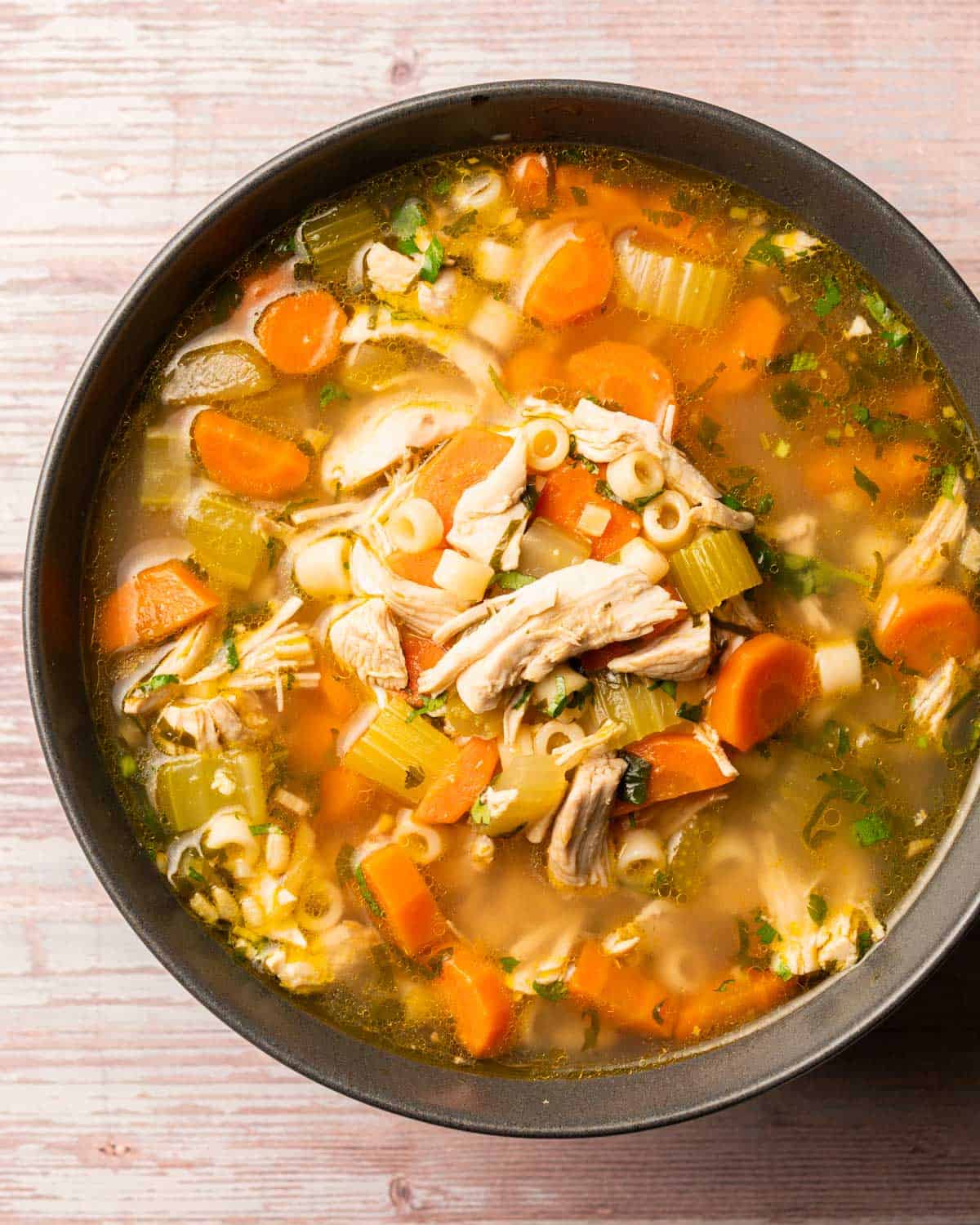 a bowl containing ginger chicken soup