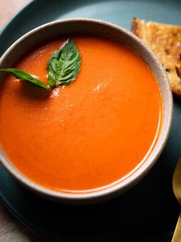 garlic tomato soup in a bowl